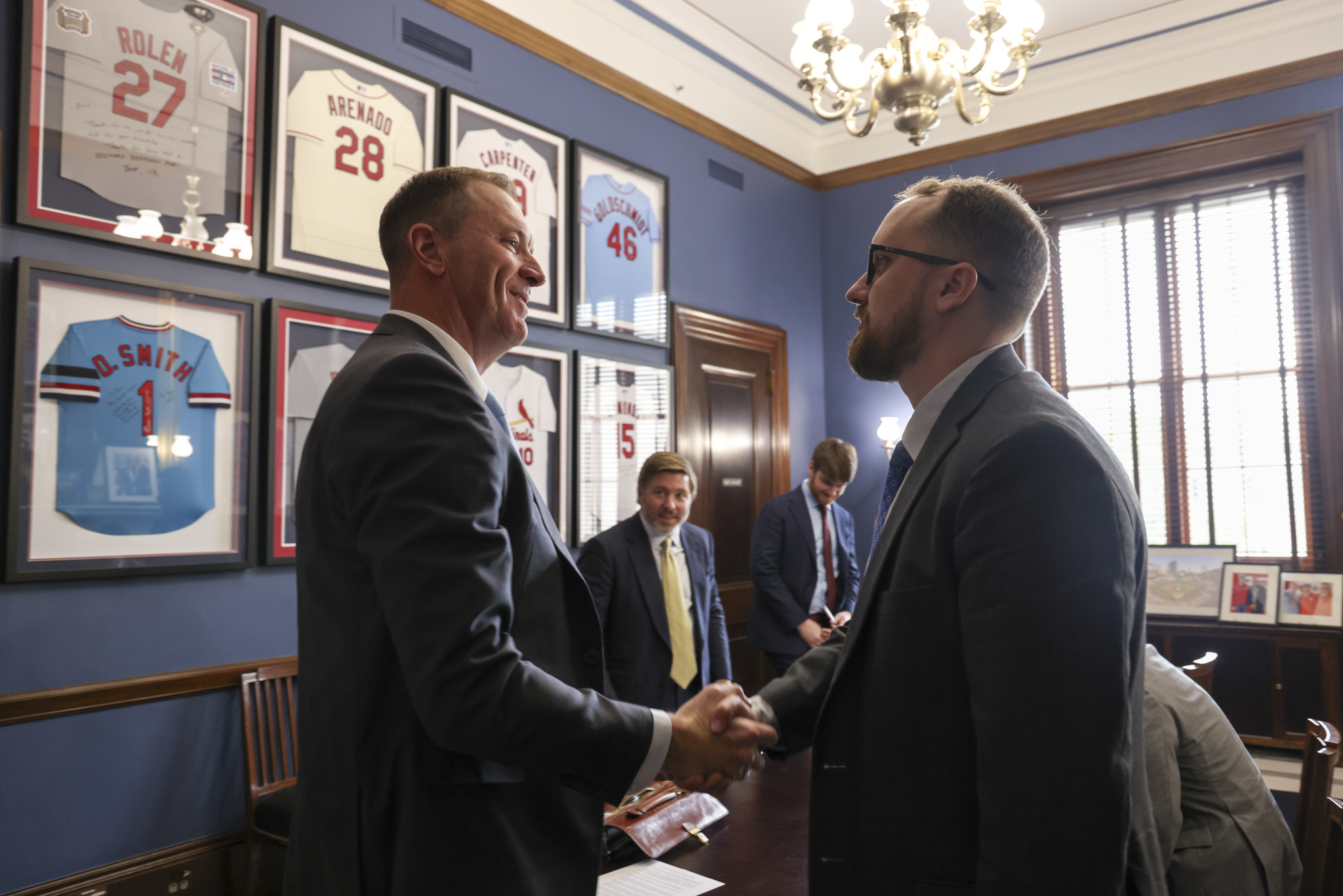 Doug Mackey and Senator Eric Schmitt shaking hands on Capitol Hill